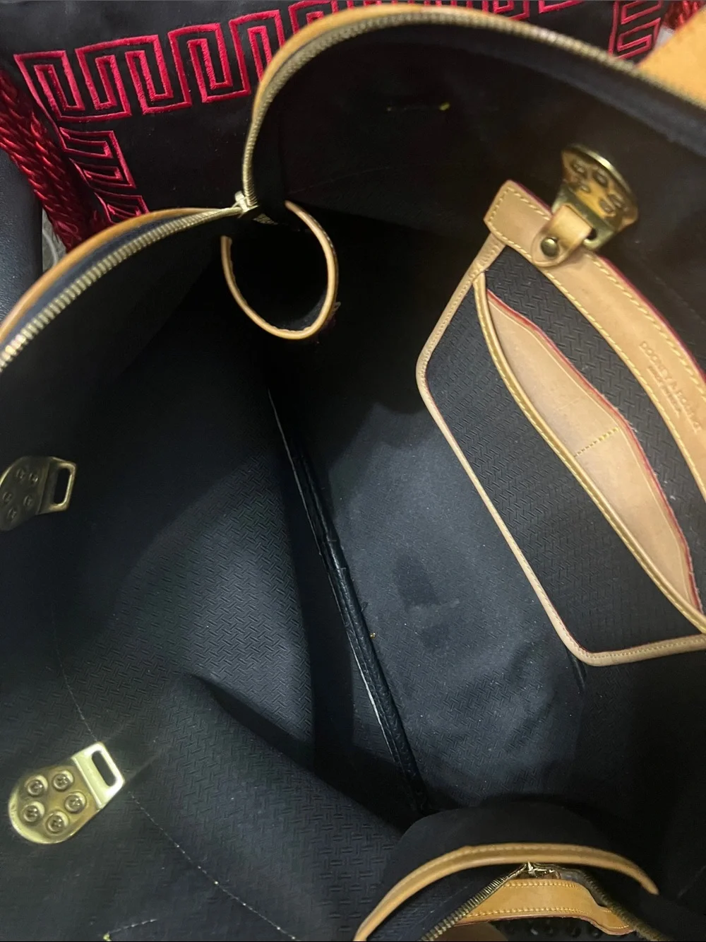Dooney & Bourke Black and Tan Satchel with Gold Hardware